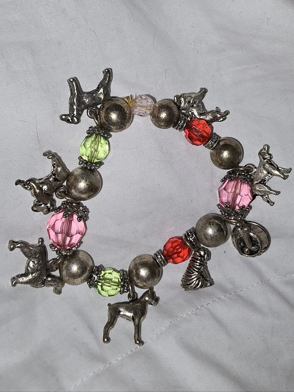 Silver-tone Dog Charm Beaded Bracelet with Pink, Red & Green Faceted Beads
